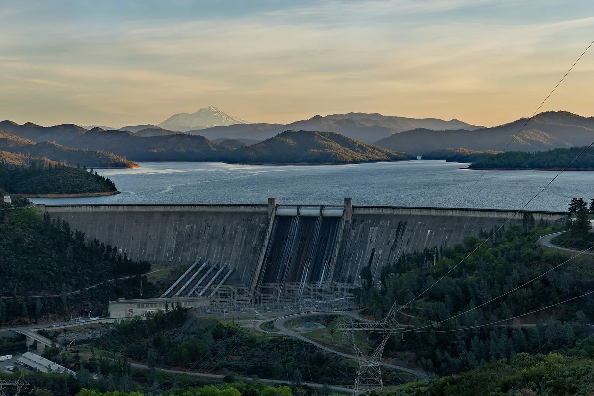 Shasta Dam with Shasta Lake and Mount Shasta at sunrise